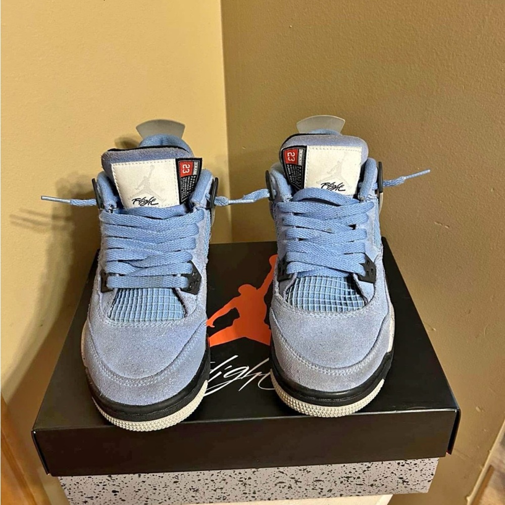 Air Jordan 4 Retro University Blue Sneakers